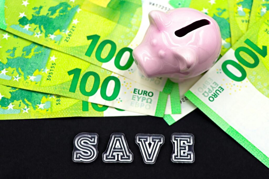 Labeled savings categories and budgeting materials arranged neatly on a desk