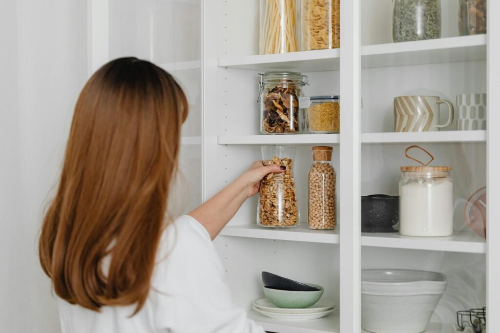 Organized pantry with basic groceries for a no-spend challenge