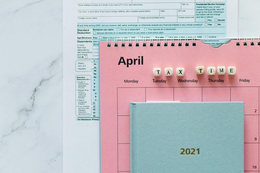 A monthly calendar with due dates and paydays marked for cash-flow planning