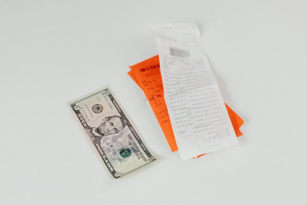 Grocery receipt and handwritten meal plan next to pantry items