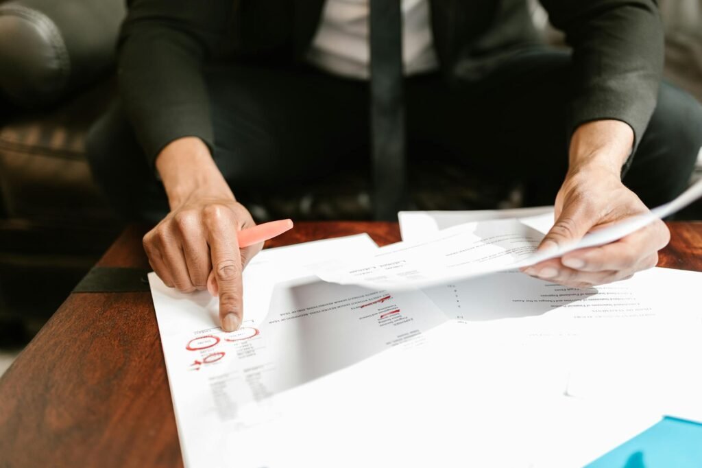 Person highlighting a warranty or return policy document