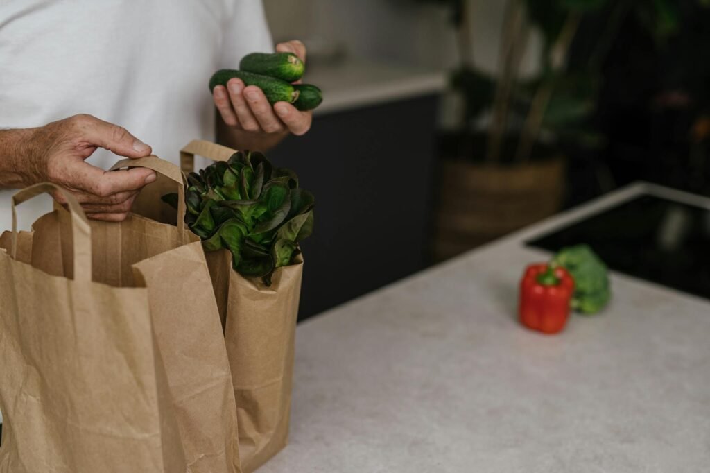 Grocery receipt and groceries on a kitchen counter