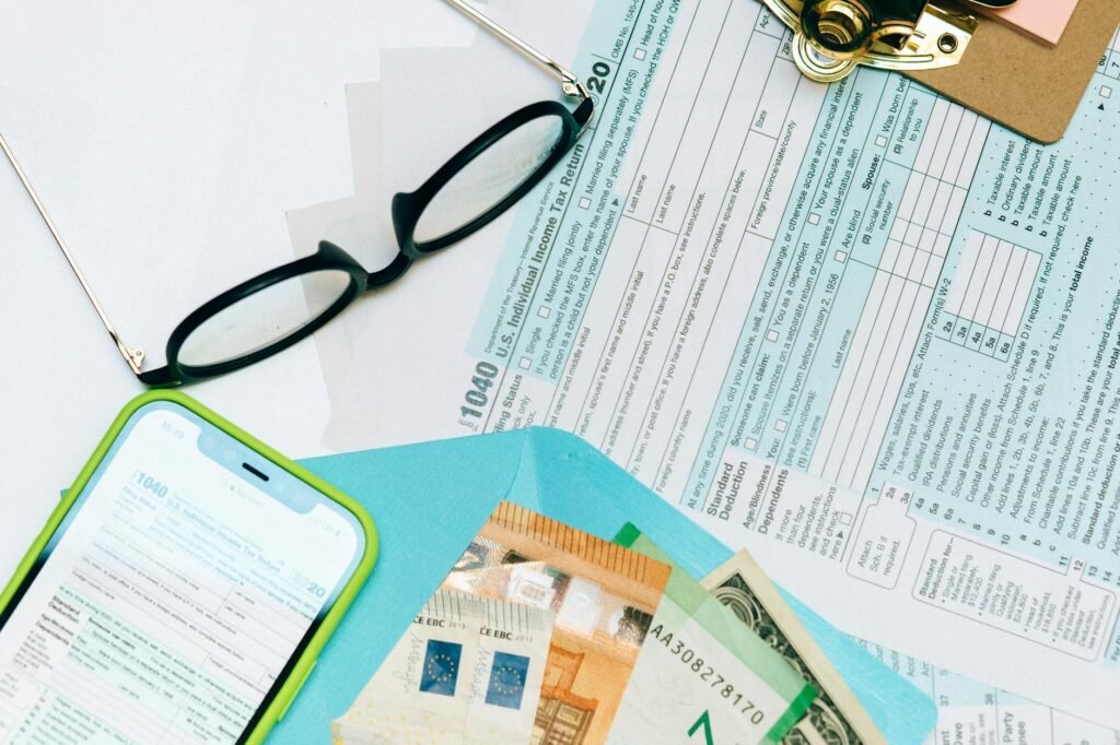 Utility bill envelope next to a smartphone on a table